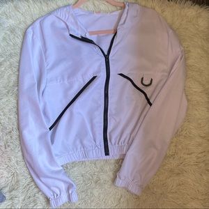 White and black NWOT wind breaker